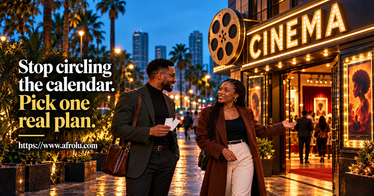 Two adult Black professionals talk outside a cinema as one holds blank admission cards.