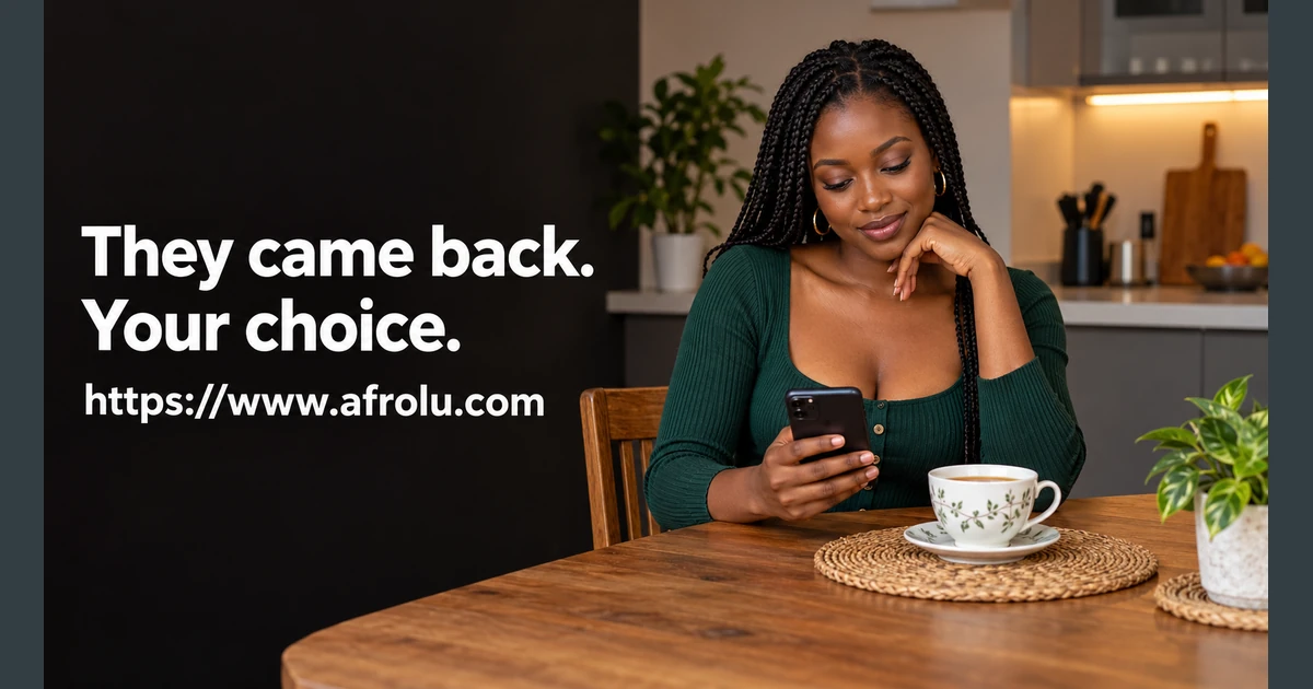 An adult woman considers a phone at a table.