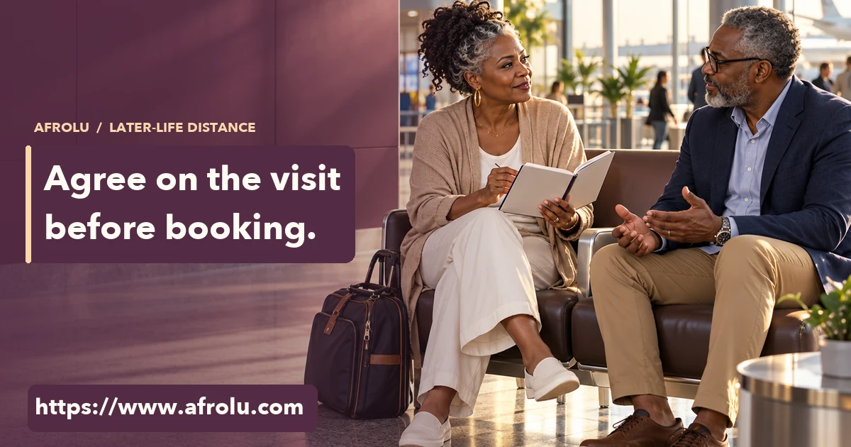 Two older adults discuss a travel plan as equals in a quiet airport lounge.