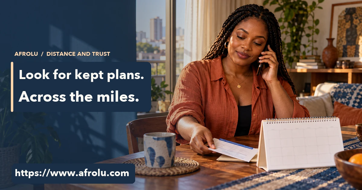 An adult woman in the diaspora reviews an unmarked travel plan beside a phone at home, with evening light on her face.