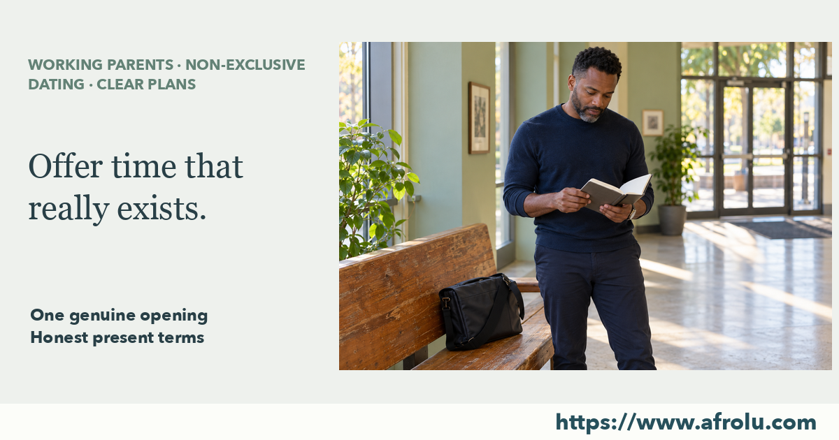 An adult looks at an open unlettered notebook while standing in a sunlit community-centre foyer beside a work bag.