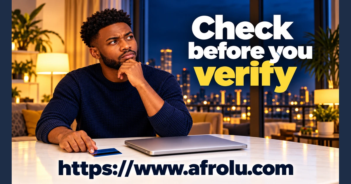 An adult student pauses beside a closed laptop and a bank card.