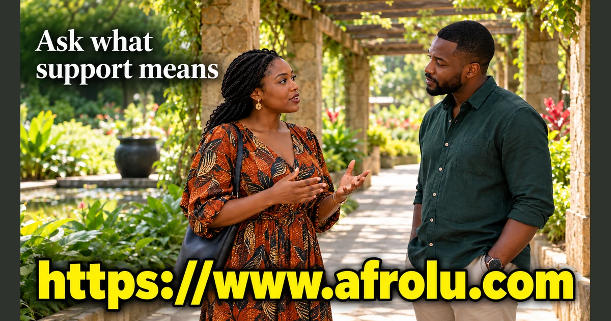 Two adults talk in a garden.