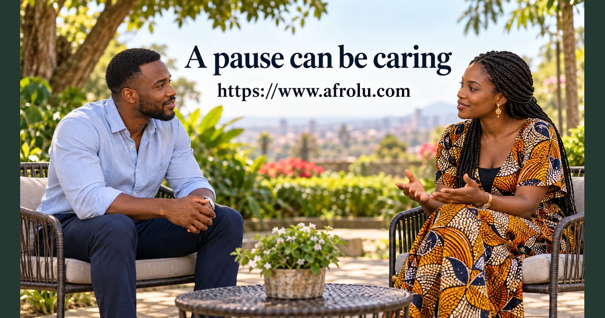 Two adults sit apart outdoors.