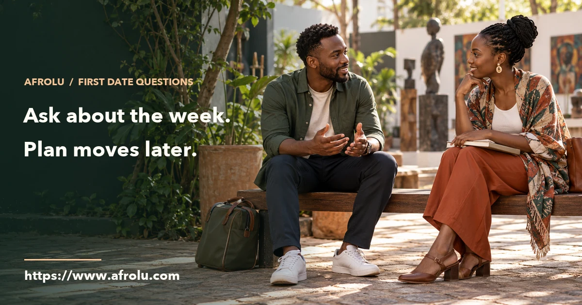 Two adults talk at a public arts courtyard, with a closed travel bag and notebook beside them.