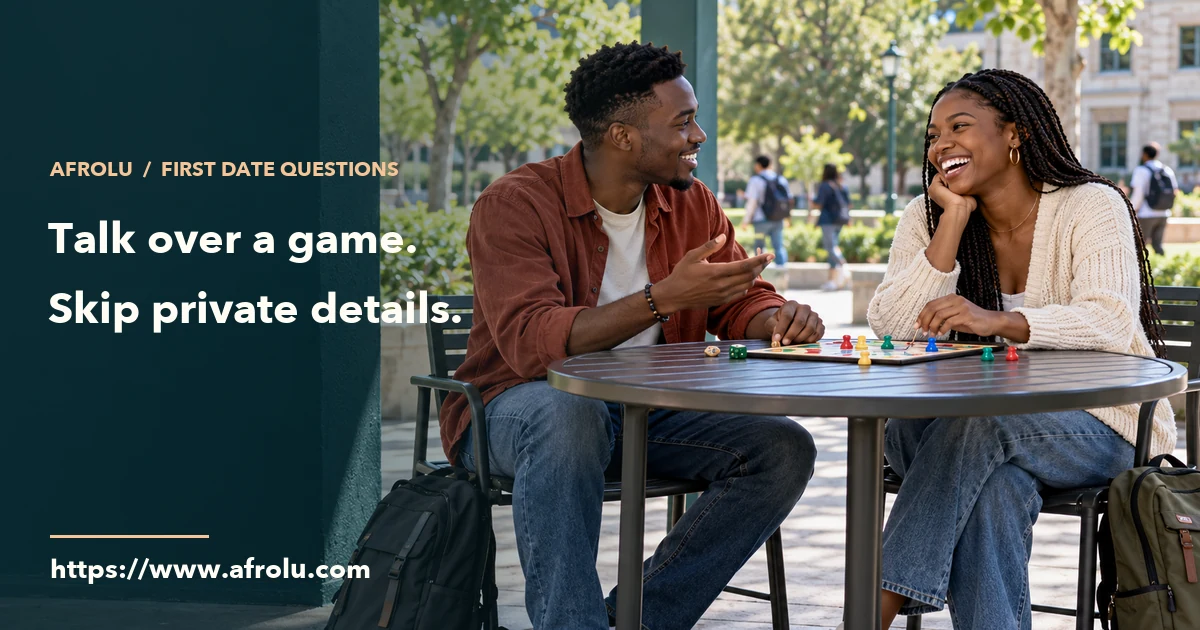 Two adult students talk over a board game at a public campus pavilion.