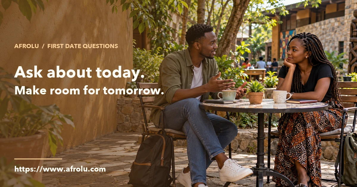 Two adult students talk over tea in a public garden with closed notebooks beside them.