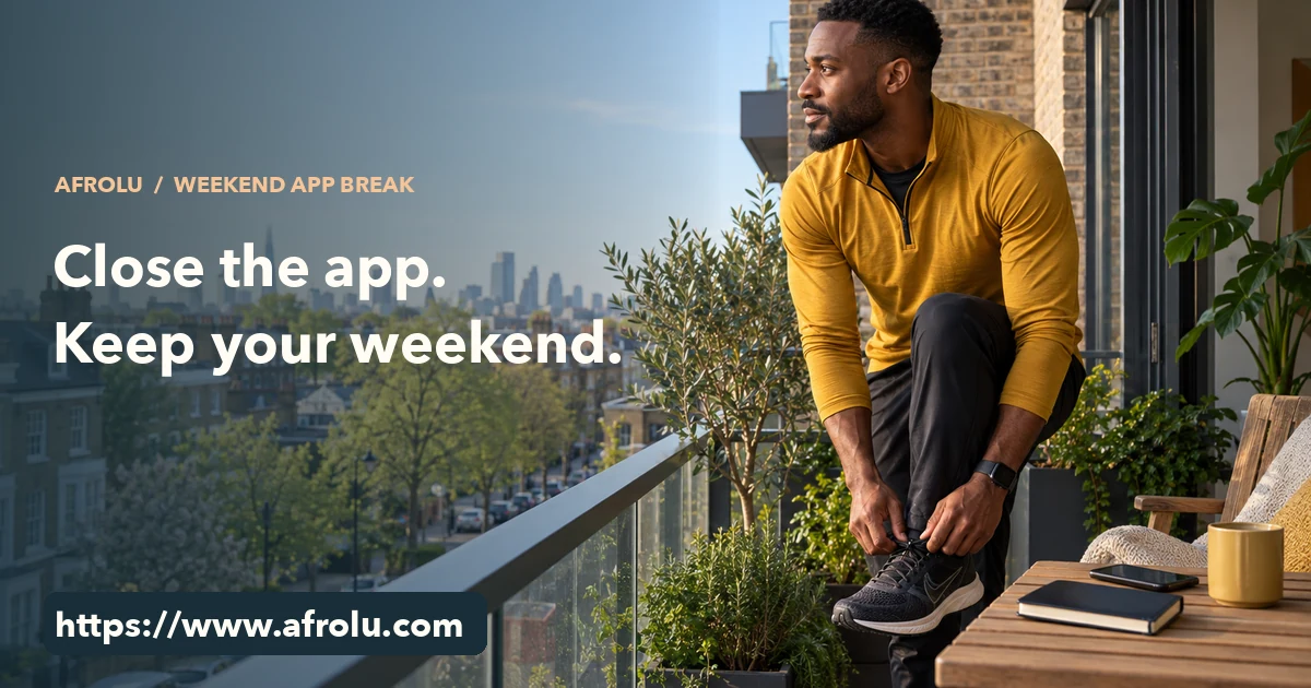 A man on a London balcony ties a walking shoe while a phone lies face down beside a closed notebook.