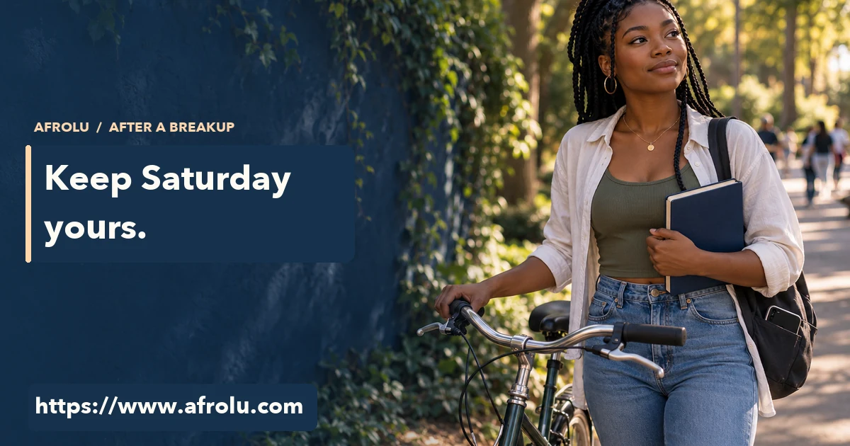 An adult student pauses beside her bicycle with a notebook on a campus path.