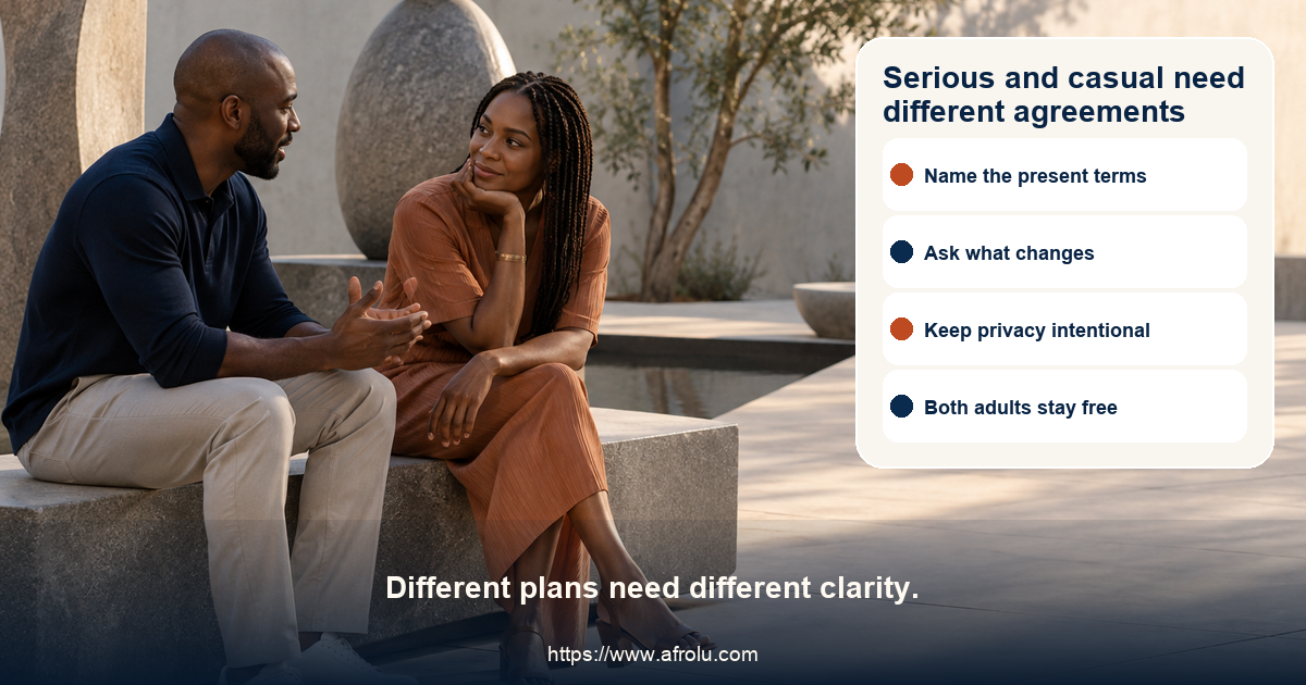 Two clearly adult Black people in a calm modern outdoor gallery courtyard having an attentive conversation beside neutral abstract sculpture, with no travel or cultural markers.