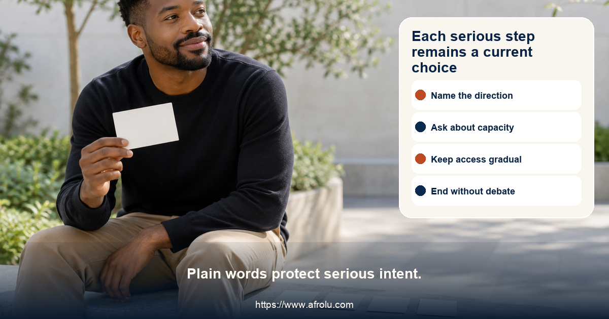 Clearly adult Black man in a neutral public courtyard holding a blank discussion card beside four smaller blank cards in an open balanced arrangement.
