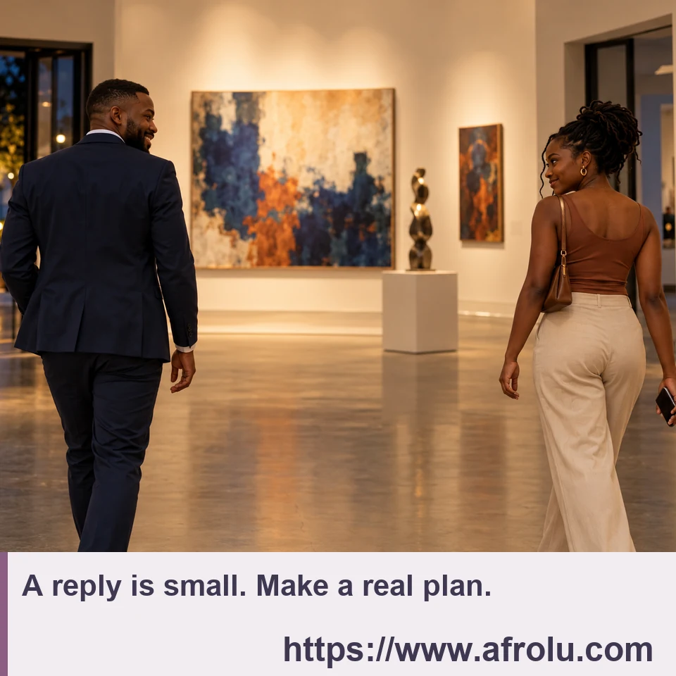 Two adults finish a gallery visit with space between them while one carries a phone at her side.