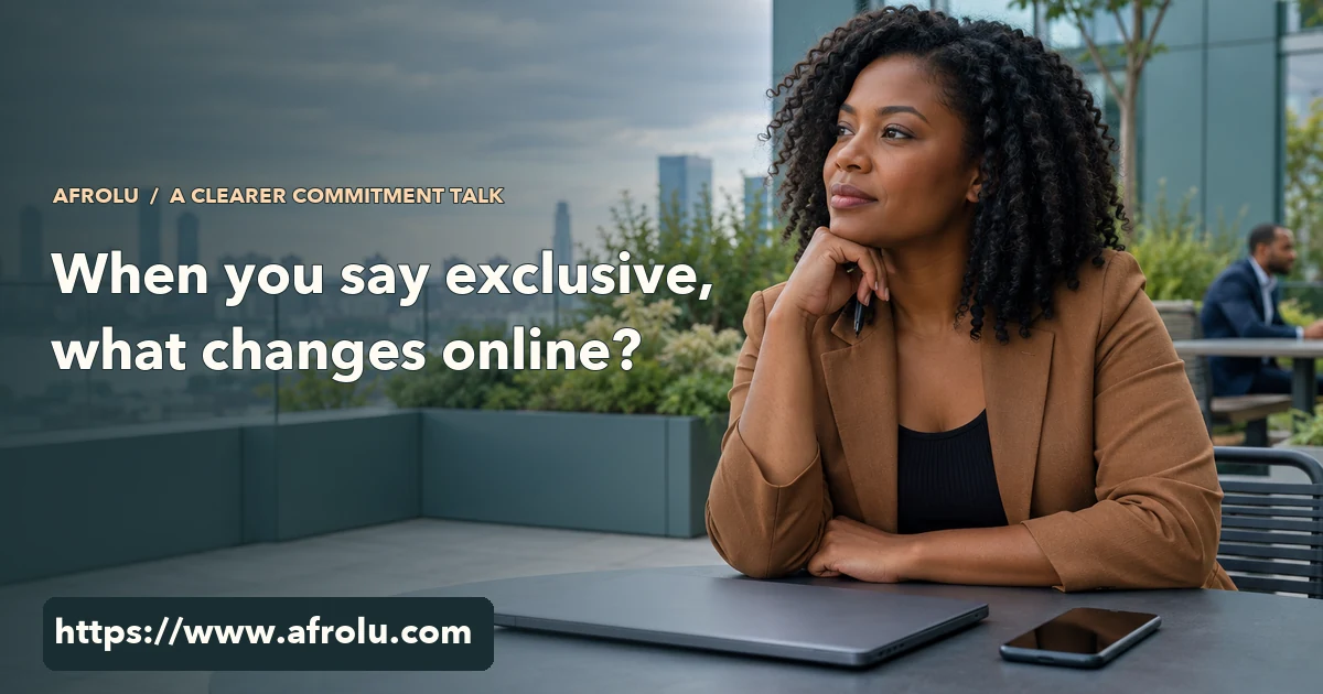 An adult professional sits in a quiet office rooftop garden with a closed laptop and an unlit phone before a conversation about exclusivity.