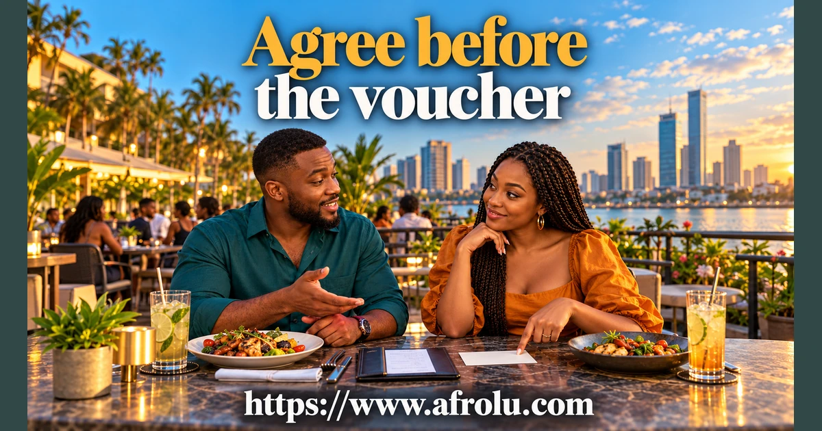 Two adults discuss a voucher and meal at a restaurant table.